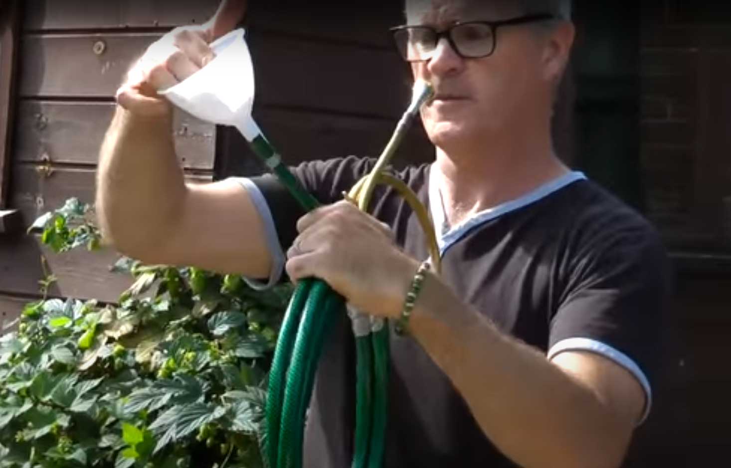 OAE Horn player Martin Lawrence making a hosepipe horn