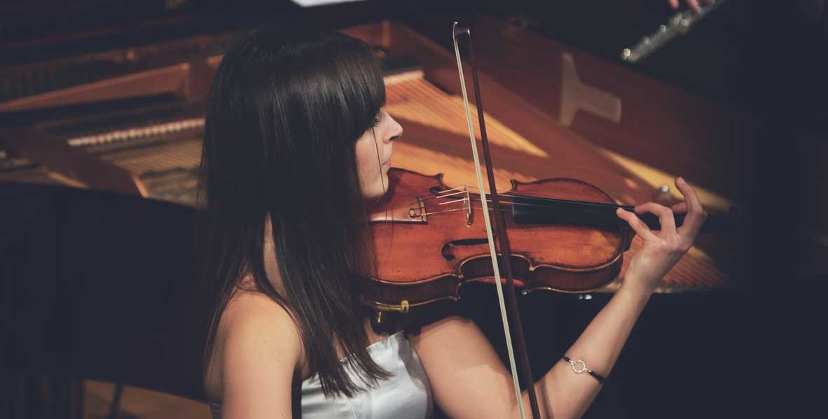 A violinist playing a concerto
