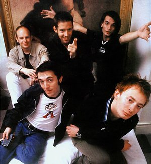 in clockwise order: Colin, Phil, Ed, Jonny, and Thom